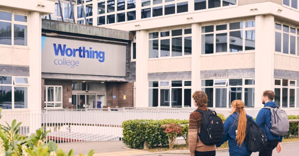 Students walking outside the entrance of Worthing College