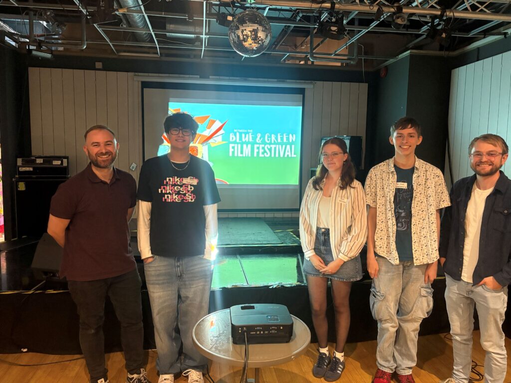 Worthing College Digital Media students Rosie Evans, Jacob Sparks and Maz Lewis with FIlm and Media staff Darren Borg and Ellis Langdell